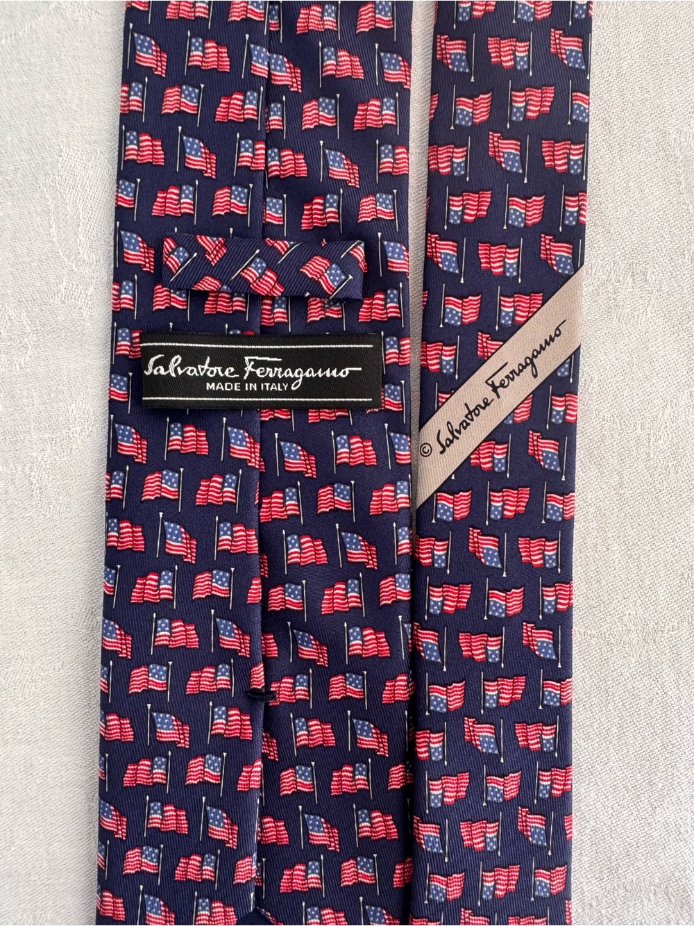 Salvatore Ferragamo Navy Blue Tie with Red & White Flag Motif